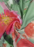 طبعة زهور باللونين الأخضر النعناعي والأحمر